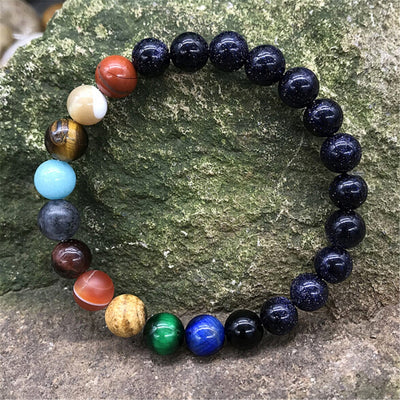 Beau Bracelet "Galaxie" avec les 9 Planètes et le Soleil en Pierres Naturelles