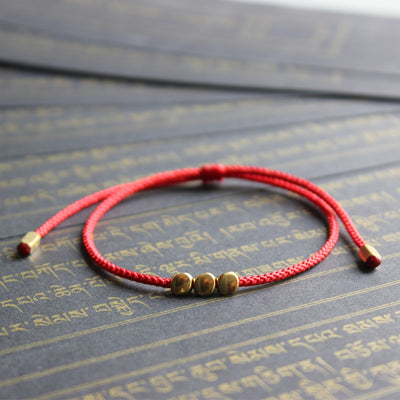 Bracelet Bouddhiste fait à la main en perles de cuivre