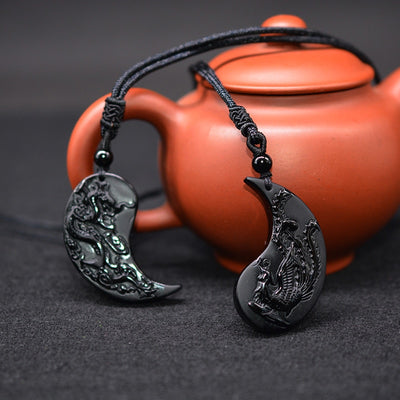 Collier pendentif obsidienne sculpture Dragon et Phoenix