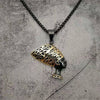 Pendentif Néfertiti noir et plaqué or avec chaîne