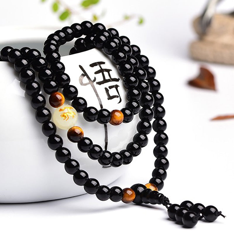 Bracelet Mala Dragon Lumineux en perles d'Onyx Noire et Oeil de tigre